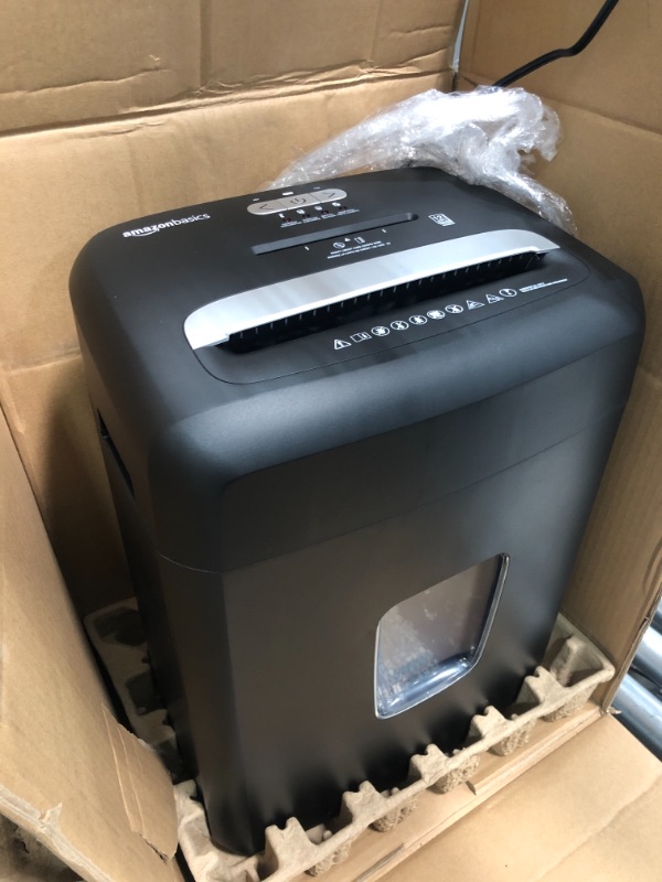 Photo 1 of Amazon Basics Micro Cut Paper Shredder and Credit Card CD Shredder with 6 Gallon Bin, 12 Sheet Capacity
