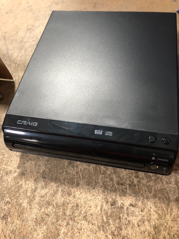 Photo 2 of Craig CVD512a Compact DVD Player with Remote in Black Compatible with DVD/DVD-R/DVD-RW/JPEG/CD-R/CD-RW/CD Progressive Scan Multilingual Supported