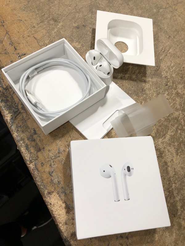 Photo 2 of Apple AirPods with Charging Case (Latest Model)