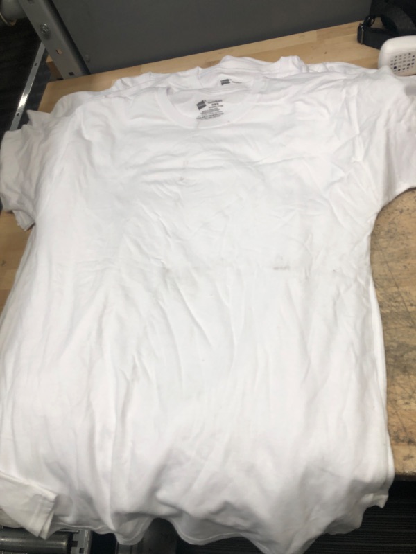 Photo 1 of **bundle of 10 white Hanes t-shirts
**dirty from warehouse 