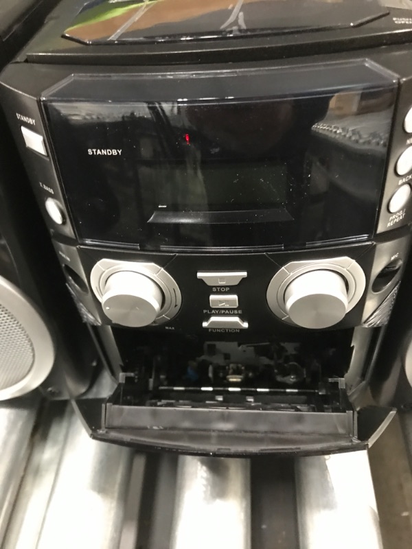 Photo 4 of NAXA Electronics NPB-426 Portable CD Player with AM/FM Stereo Radio, Cassette Player/Recorder and Twin Detachable Speakers