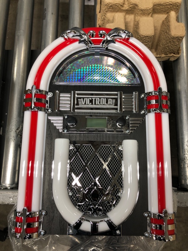 Photo 1 of Victrola Nostalgic Wood Countertop Jukebox with Built-in Bluetooth Speaker, 50's Retro Vibe, 5 Bright Color-Changing LED Tubes, FM Radio, Wireless Music Streaming, AM/FM Radio, Aux Input