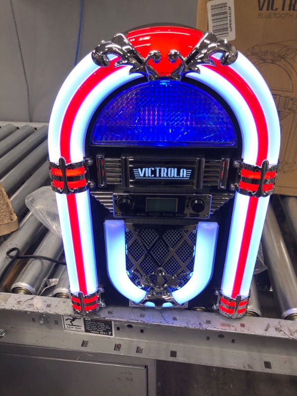 Photo 4 of Victrola Nostalgic Wood Countertop Jukebox with Built-in Bluetooth Speaker, 50's Retro Vibe, 5 Bright Color-Changing LED Tubes, FM Radio, Wireless Music Streaming, AM/FM Radio, Aux Input