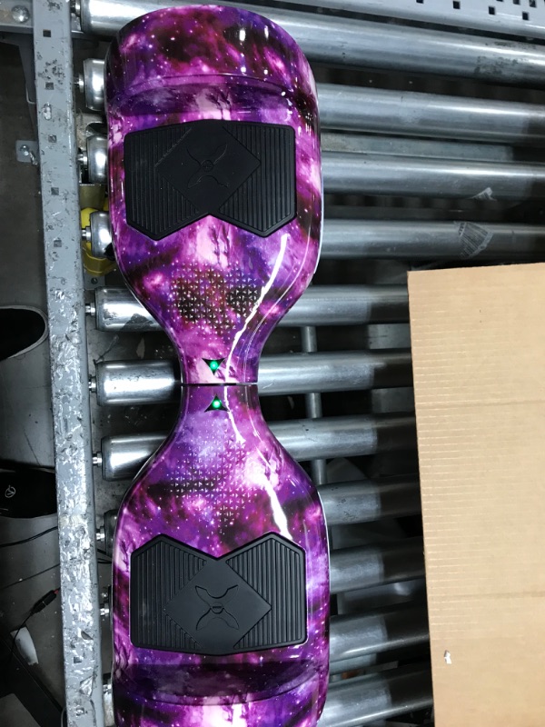 Photo 2 of Hover-1 Helix Electric Hoverboard | 7MPH Top Speed, 4 Mile Range, 6HR Full-Charge, Built-in Bluetooth Speaker, Rider Modes: Beginner to Expert Hoverboard Galaxy