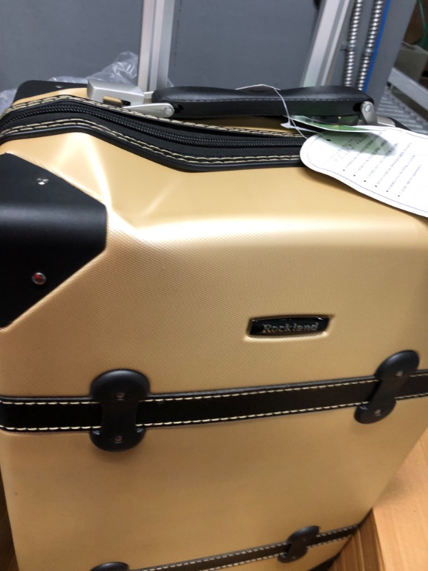 Photo 3 of **DENTS SEE PHOTO**
Rockland Stage Coach 20-Inch Rolling Trunk, Champagne 20-Inch Champagne