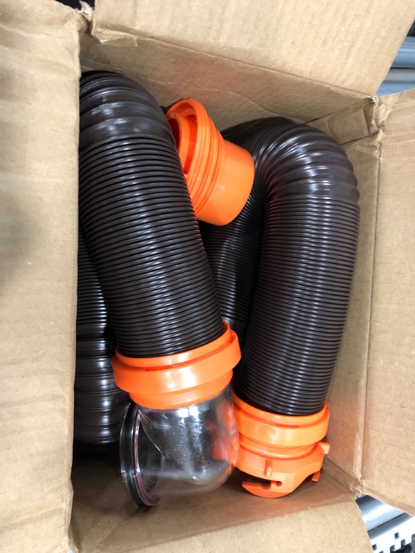 Photo 2 of Camco RhinoFLEX RV Sewer Hose Kit with Swivel Transparent Elbow and 4-in-1 Dump Station Fitting, Brown, 15 Feet (39770) 15ft Sewer Hose Kit Frustration-Free Packaging