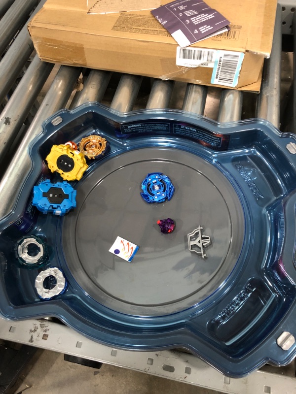 Photo 2 of BEYBLADE Burst Pro Series Evo Elite Champions Pro Set -- Complete Battle Game Set with Beystadium, 2 Battling Top Toys and 2 Launchers Frustration-Free Packaging