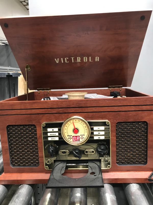 Photo 2 of parts only    Victrola Nostalgic 6-in-1 Bluetooth Record Player & Multimedia Center with Built-in Speakers - 3-Speed Turntable, CD & Cassette Player, FM Radio | Wireless Music Streaming | Mahogany Mahogany Entertainment Center