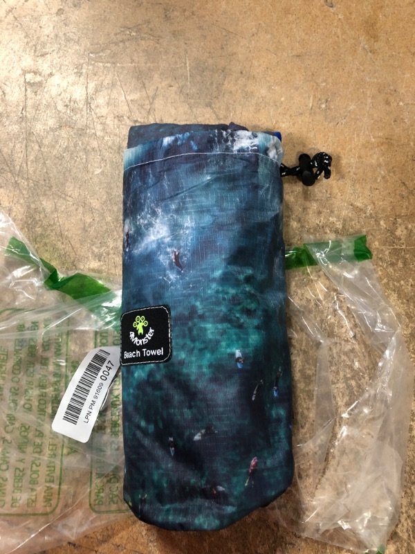 Photo 1 of 4Monster Microfiber Beach Towel Quick Dry, Super Absorbent Lightweight Towel for Swimmers, Sand Free Towel, Beach Towels for Pool, Swim, Water Sports Size L 63 x 31.5 in.