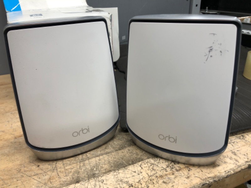 Photo 2 of NETGEAR Orbi Whole Home Tri-band Mesh WiFi 6 System (RBK852) – Router with 1 Satellite Extender | Coverage up to 5,000 sq. ft., 100 Devices | AX6000 (Up to 6Gbps) , White('SCRATCHED and UNABLE TO TEST ")
