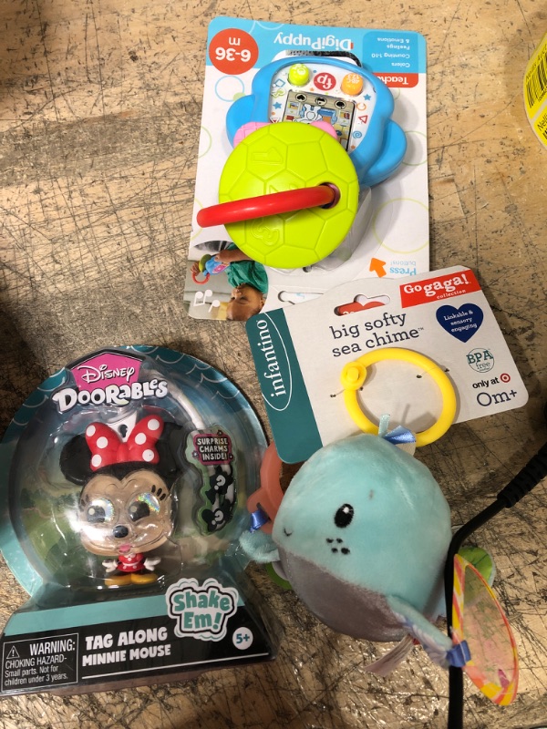 Photo 1 of Disney Doorables Tag a Longs Minnie 
Fisher-Price Laugh & Learn DigiPuppy
Infantino Go Gaga! Big Softy Sea Chime Baby Toy
bundle of 2
