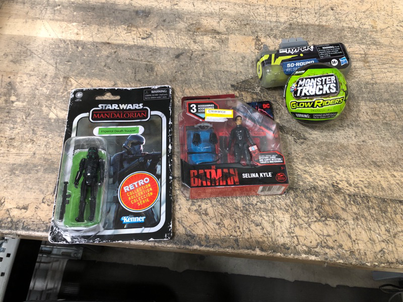 Photo 1 of bundle of 4 boy toys----nerf hyper canister, monster truck ball , the batman selina kyle , kenner star wars figure 