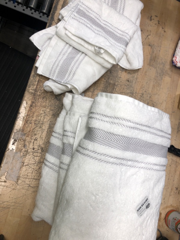 Photo 1 of **bundle of 6 towels**
 3 bath towels, 3 hand towels 