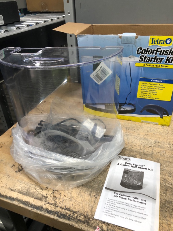 Photo 1 of Tetra ColorFusion Starter aquarium Kit 3 Gallons, Half-Moon Shape, With Bubbler And Color-Changing Light Disc
