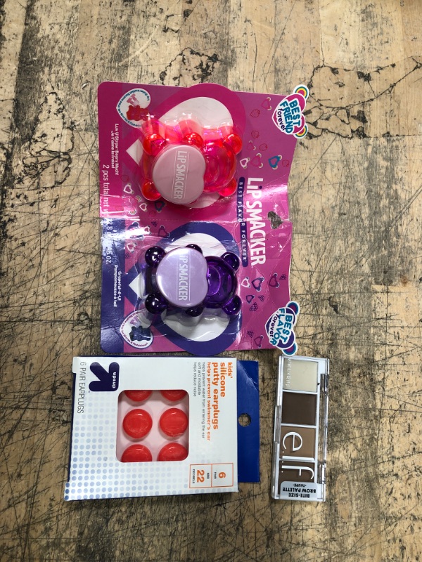 Photo 1 of **bundle of 3 items, lip gloss, silicon ear plugs, eyebrow makeup**