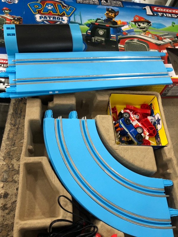 Photo 3 of Carrera First Paw Patrol - Slot Car Race Track - Includes 2 Cars: Chase and Marshall - Battery-Powered Beginner Racing Set for Kids Ages 3 Years and Up, Multi