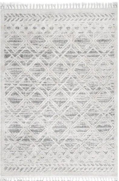 Photo 1 of 
nuLOOM
Ansley Textured Lattice Tassel Beige 5 ft. 3 in. x 7 ft. 7 in. Area Rug