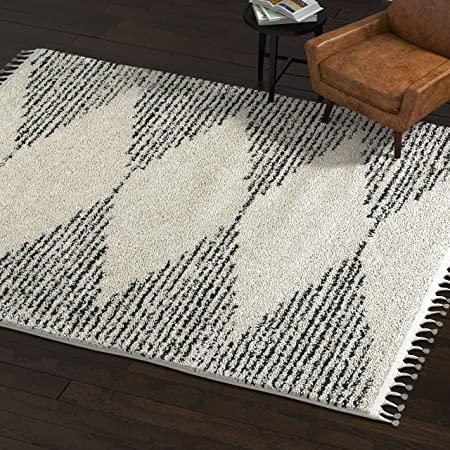 Photo 1 of Amazon Brand – Rivet Contemporary Polypropylene Area Rug, 7' 10" x 10', Ivory
