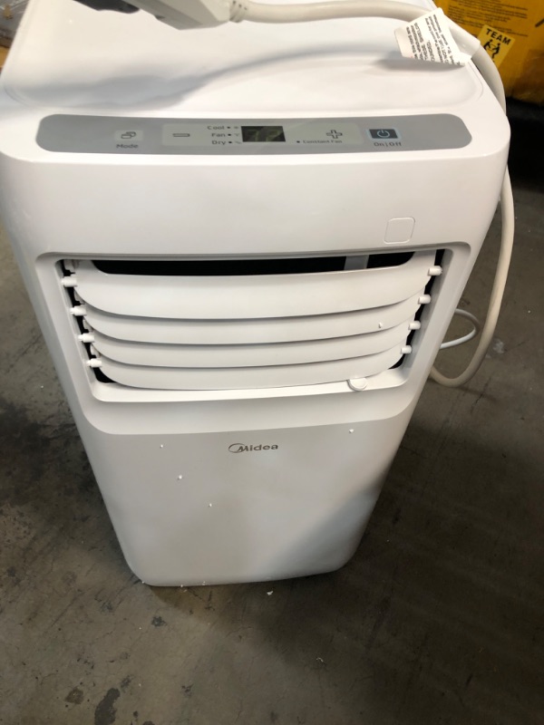 Photo 2 of ***READ NOTES***
Midea 8,000 BTU ASHRAE (5,300 BTU SACC) Portable Air Conditioner, Cools up to 175 Sq. Ft., Works as Dehumidifier & Fan, Remote Control & Window Kit Included
