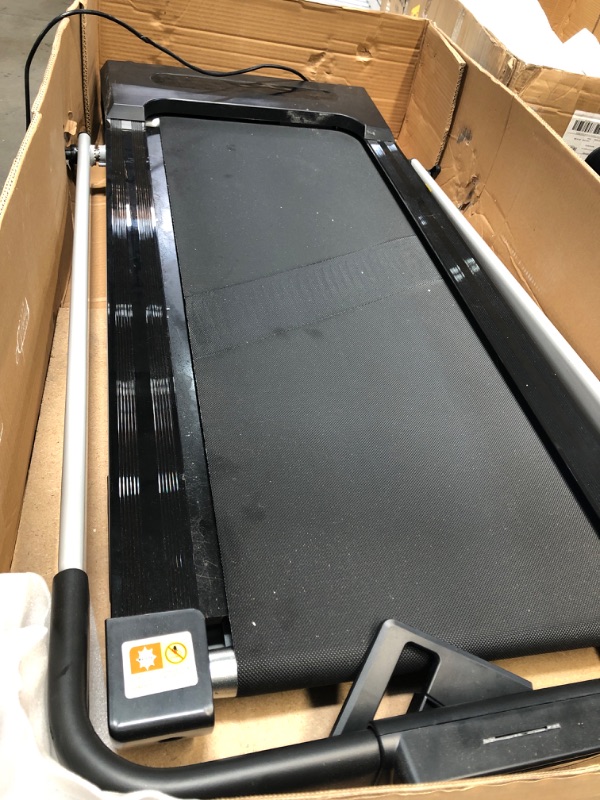 Photo 1 of Foldable electric treadmill nonfunctional parts only 