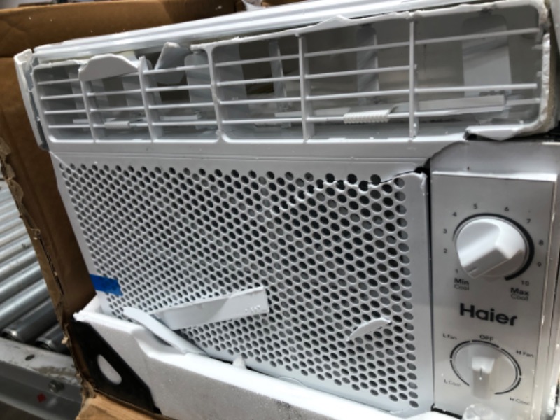 Photo 2 of (DAMAGED, FOR PARTS ONLY)Haier Mechanical Window Air Conditioner | 5,050 BTU | Easy Install Kit Included | Dual Mechanics for Cooling Fan Power and Temperature Control | Cools up to 150 Square Feet | 115 Volts | White
**BACK IS CRUSHED, FRONT BROKEN, DOES