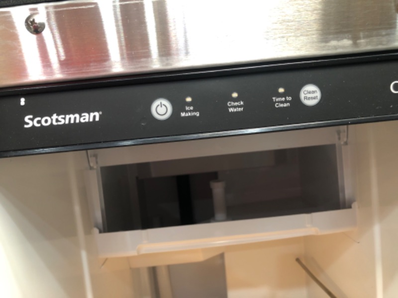 Photo 9 of Scotsman CU50 64 Pound Stainless Steel Under the Counter Indoor Outdoor Commercial Cube Ice Maker Machine with Ice Scoop and Water Sensor
