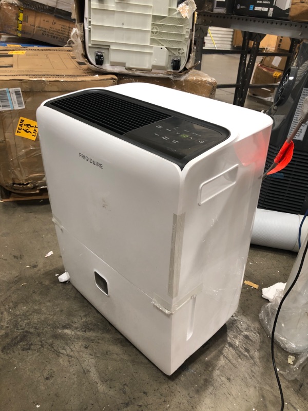 Photo 2 of Frigidaire FFAD6022W1 Dehumidifier, High Humidity 60 Pint Capacity Dehumidifier with a Easy-to-Clean Washable Filter and Custom Humidity Control for maximized comfort, in White
