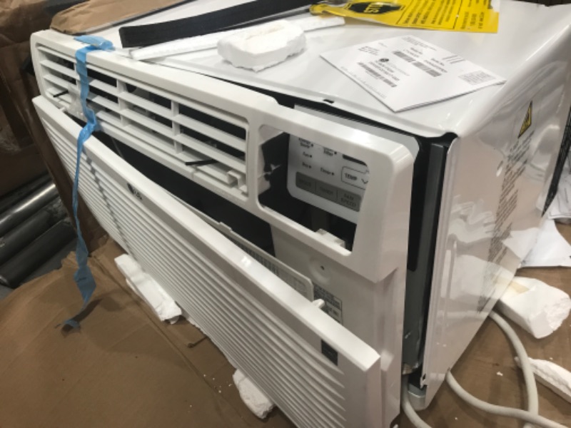 Photo 1 of ***DAMAGED*PARTS ONLY NON FUNCTIONAL* LG 11,800 BTU Through-The-Wall Remote, Cools up to 530 Sq. Ft, Energy Star, 3 Cool & Fan Speeds, Universal Design fits Most Sleeves, 115V Air...
