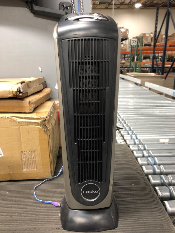 Photo 4 of **** opened for inspection****
*****tested/ works******
Lasko Oscillating Ceramic Tower Space Heater for Home with Adjustable Thermostat, Timer and Remote Control, 22.5 Inches, Grey/Black, 1500W, 751320
