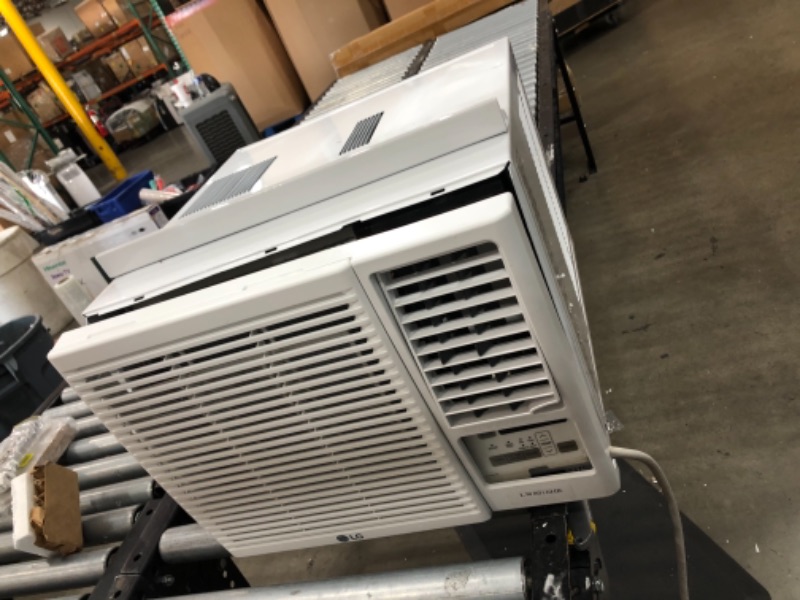 Photo 8 of **needs assembly-minor damage-please view photos**
LG 7,500 BTU Window Air Conditioner with Supplemental Heat, Cools 320 Sq.Ft. (16' x 20' Room Size), Electronic Controls with Remote, 2 Cooling, Heating & Fan Speeds, Slide In-Out Chassis, 115V
