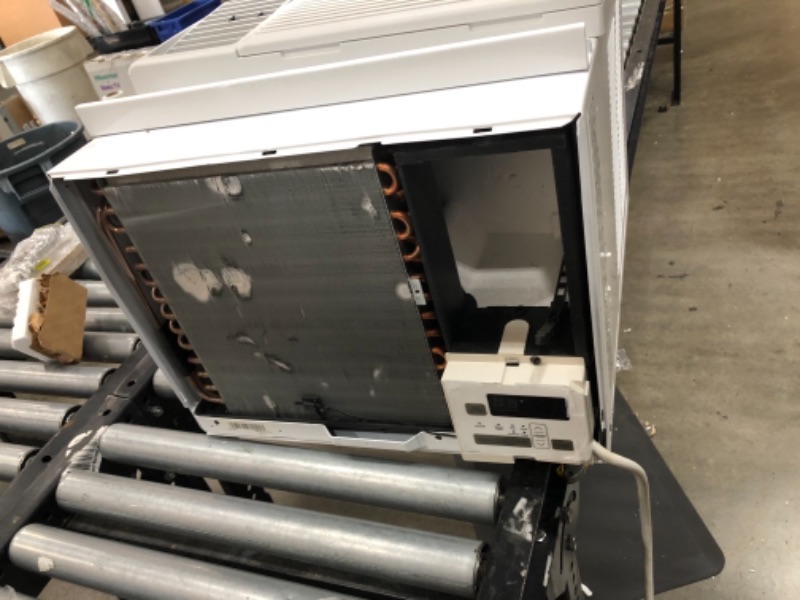 Photo 2 of **needs assembly-minor damage-please view photos**
LG 7,500 BTU Window Air Conditioner with Supplemental Heat, Cools 320 Sq.Ft. (16' x 20' Room Size), Electronic Controls with Remote, 2 Cooling, Heating & Fan Speeds, Slide In-Out Chassis, 115V
