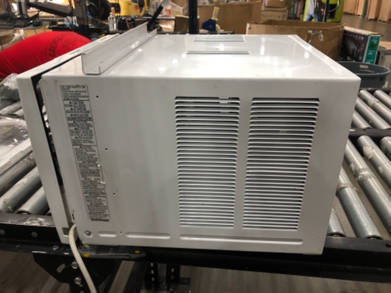 Photo 11 of **needs assembly-minor damage-please view photos**
LG 7,500 BTU Window Air Conditioner with Supplemental Heat, Cools 320 Sq.Ft. (16' x 20' Room Size), Electronic Controls with Remote, 2 Cooling, Heating & Fan Speeds, Slide In-Out Chassis, 115V
