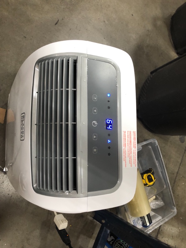 Photo 9 of **minor damaged-view photos for detail**
BLACK+DECKER 8,000 BTU Portable Air Conditioner with Remote Control, White
