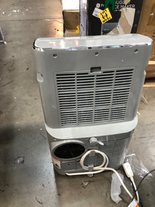 Photo 6 of ***PARTS ONLY*** GE 10,500 BTU Portable Air Conditioner for Medium Rooms up to 450 sq ft., 3-in-1 with Dehumidify, Fan and Auto Evaporation, Dual Hose Compatible, Included Window Installation Kit, Grey
- Minor cosmetic damaged 