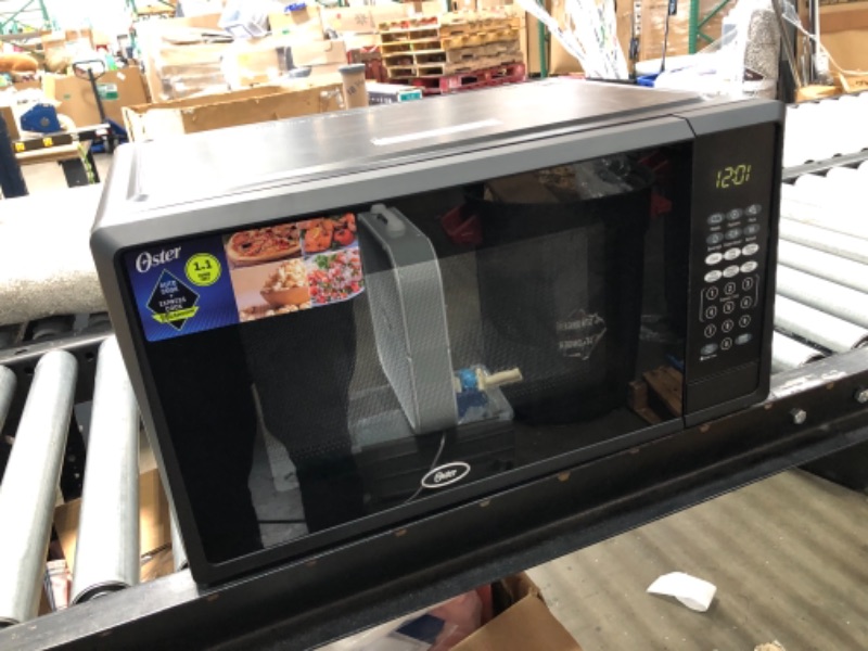 Photo 1 of ** display model-not functional**
Oster 1.1 cubic feet black DISPLAY microwave 