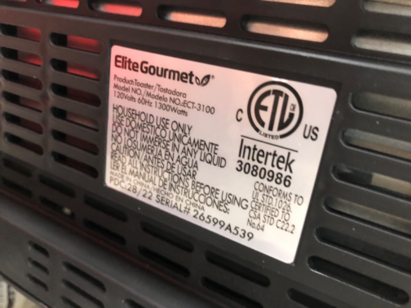 Photo 3 of **MINOR DAMAGE** Elite Gourmet ECT-3100 Long Slot 4 Slice Toaster, Reheat, 6 Toast Settings, Defrost, Cancel Functions, Built-in Warming Rack, Extra Wide Slots for Bagels & Waffles, Stainless Steel & Black 4 Slice Stainless Steel and Black