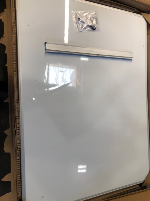 Photo 1 of Amazon Basics Magnetic Dry Erase White Board, 35 x 47-Inch Whiteboard - Silver Aluminum Frame 35" x 47" Magnetic, Aluminum Frame