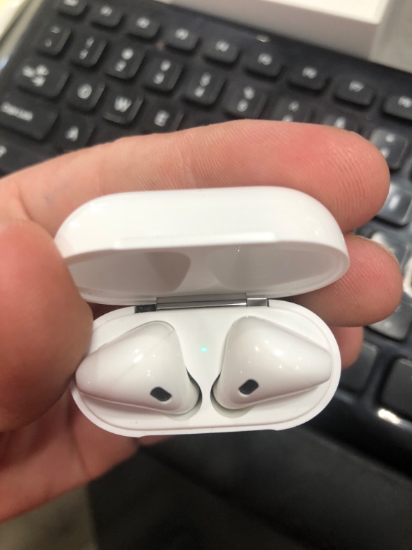 Photo 3 of Apple AirPods (2nd Generation) Wireless Earbuds with Lightning Charging Case Included. Over 24 Hours of Battery Life, Effortless Setup. Bluetooth Headphones for iPhone
