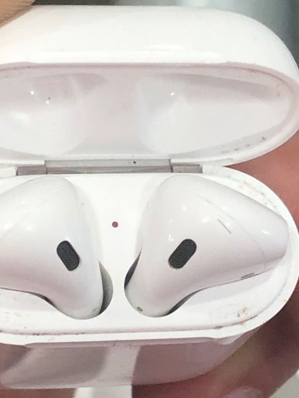 Photo 2 of Apple AirPods (2nd Generation) Wireless Earbuds with Lightning Charging Case Included. Over 24 Hours of Battery Life, Effortless Setup. Bluetooth Headphones for iPhone