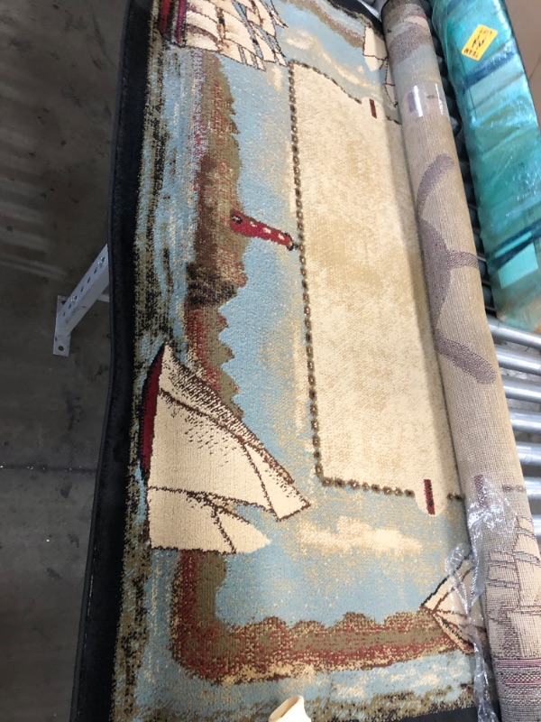 Photo 1 of 5'X7' BROWN AREA RUG 