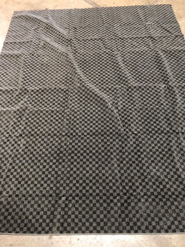 Photo 3 of 11' x 7'5" green rug with tiny squares rubber bottom