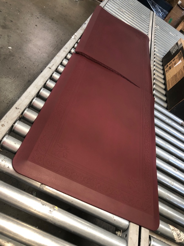 Photo 1 of **DAMAGED**  70 X 24IN RED OUTDOOR RUNNER PAD