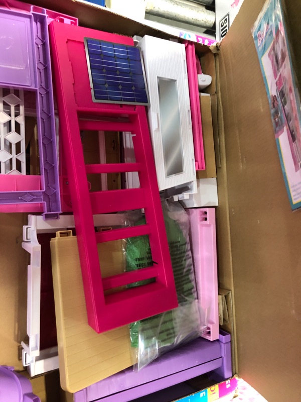 Photo 4 of Barbie Dreamhouse Dollhouse with Wheelchair Accessible Elevator, Pool, Slide and 70 Accessories