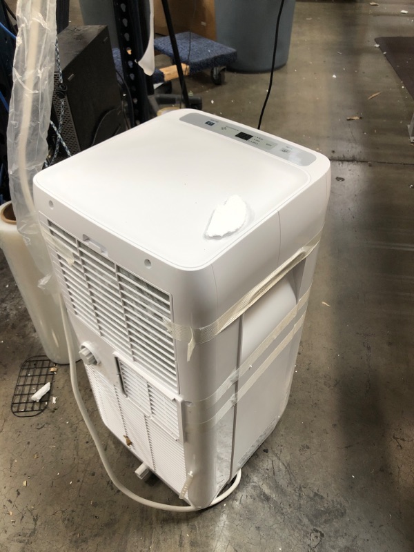 Photo 4 of Midea 8,000 BTU ASHRAE (5,300 BTU SACC) Portable Air Conditioner, Cools up to 175 Sq. Ft., Works as Dehumidifier & Fan, Remote Control & Window Kit Included
