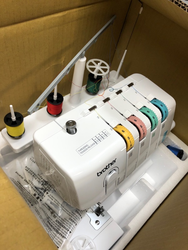 Photo 1 of Brother Serger, 1034D, Heavy-Duty Metal Frame Overlock Machine, 1,300 Stitches Per Minute, Removeable Trim Trap, 3 Included Accessory Feet