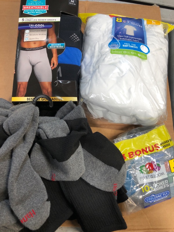 Photo 1 of Bundle of 4- assorted mens socks, underwear, t shirts- various sizes, large, medium