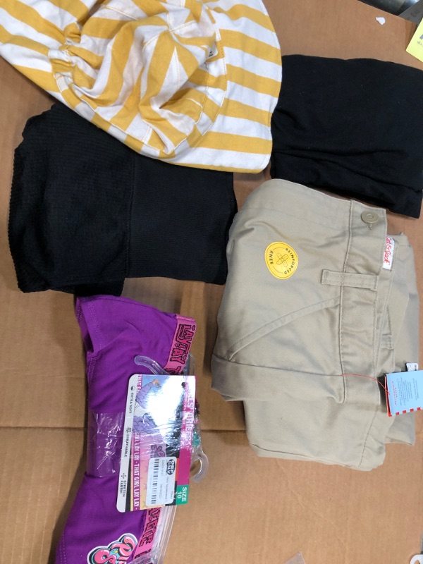 Photo 1 of Bundle of 5- assorted girls clothing- leggings, shirt, pants- various sizes; large, small 