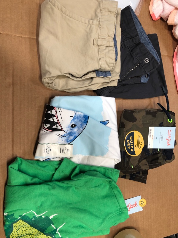 Photo 1 of Bundle of 5- assorted boys clothing- various sizes- small, medium, 2T 