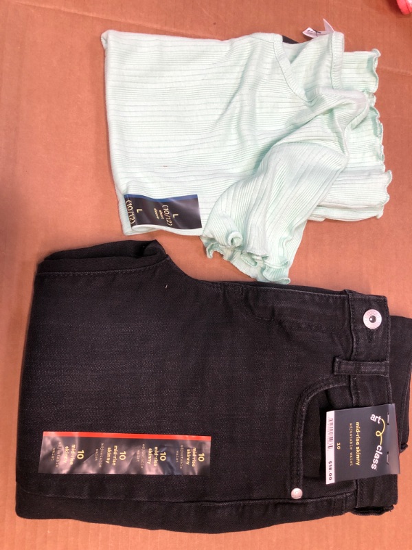 Photo 1 of Bundle of two- girls outfit- Size LARGE 10/12 pants & shirt 