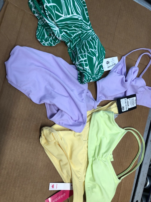 Photo 1 of Bundle of 4- assorted various sized bikinis- large, medium 